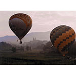 Mongolfier flight over the "Giardino di Leonardo" with Vinci in the background.