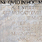 Iscrizione celebrativa del 1705 sopra il portale d'ingresso dei Bottini dell'Olio, Livorno.