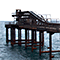 Vecchio pontile per il trasporto del ferro presso il porto di Rio Marina.