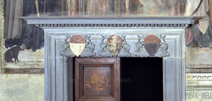 Lippo Memmi’s Majesty: restoration by Benozzo above the left-hand door, San Gimignano Town Hall.