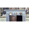 Lippo Memmi’s Majesty: restoration by Benozzo above the left-hand door, San Gimignano Town Hall.