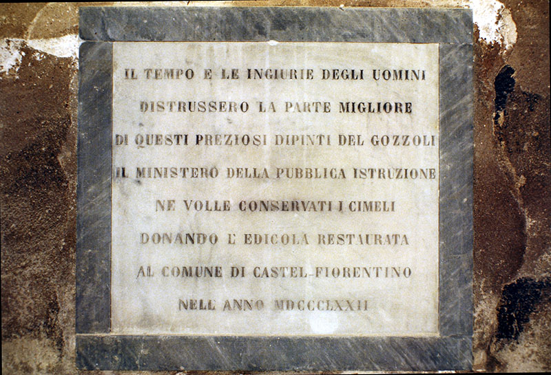 Commemorative plaque affixed when the chapel was built to protect the frescos (1872).