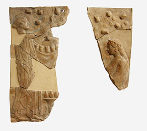 Fragments of pinax with fruit harvesting scene