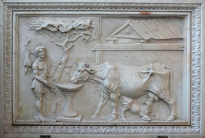 Relief carving with rustic scene