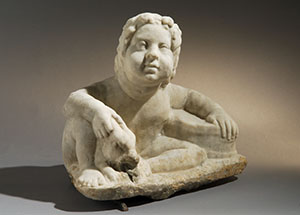 Seated boy with a rabbit