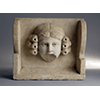 Corbel with female mask