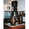 Must filtering machine  for the production of "vin dolce"; below, barrels of wine, Montescudaio, c. 1940, Museo della Vita e del Lavoro della Maremma Settentrionale, La Cinquantina, Cecina.
