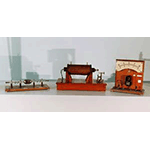 Righi oscillator (at left) Ruhmkorff coil (at center), two-capacity galvanometer for direct current, State Science Liceo "U. Dini", Pisa.