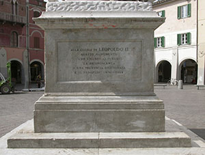 Base of the monument sculpted by Luigi Magi and erected in 1846 in Piazza Dante at Grosseto to commemorate the land reclamation projects carried out under Leopoldo II in Maremma.