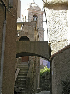 Narrow lane in the medieval town of Giglio Castello.