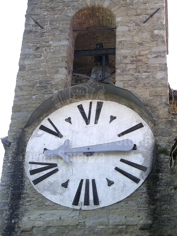 Clock on the tower at the entrance to Castel San Niccol.