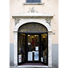 Main entrance to the Pharmacy Cepellini, now occupied by an artisan's bookbinding establishment, Pontremoli.