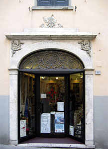 Main entrance to the Pharmacy Cepellini, now occupied by an artisan's bookbinding establishment, Pontremoli.