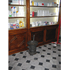Antique mortar and pestle, Pharmacy Niccolini, Massa Marittima.