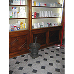 Antique mortar and pestle, Pharmacy Niccolini, Massa Marittima.