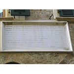 Stone tablet on the house of Paolo Mascagni, Pomarance.