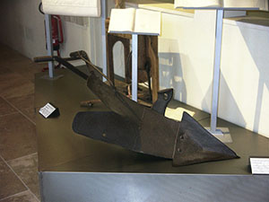 Traditional tools of work, asymmetrical plough, Museum of Grapes and Wine, "I Lecci" Wine Culture Centre, Montespertoli.