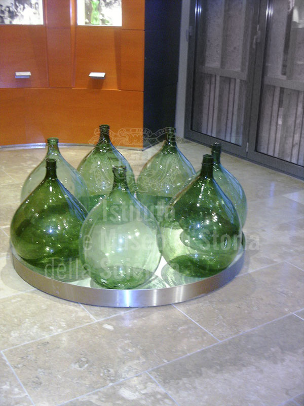 Green glass flasks to be covered in straw, Museum of Grapes and Wine, "I Lecci" Wine Culture Centre, Montespertoli.