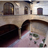 Courtyard with well in Palazzo Datini, Prato.