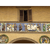"Seppellire i morti", fregio policromo robbiano sull'antica facciata dello Spedale del Ceppo, terracotta invetriata, Santi Buglioni, 1526-28, Pistoia.