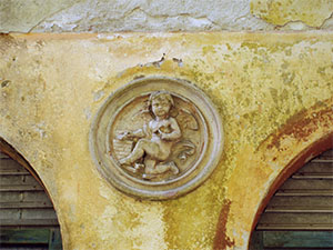 A putto working, decorative detail of the ex Bianchi Paper-mill, Bagni di Lucca.