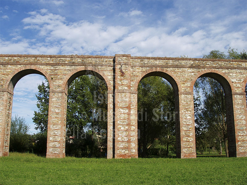 Arches of the Nottolini Aqueduct with buttress in the countryside of Lucca, Lucca.