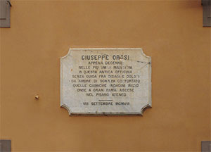 Inscription recalling the beginning of Giuseppe Orosi's scientific activity, San Giuliano Terme.