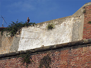 Old sundial on the walls of Forte Stella, Portoferraio.