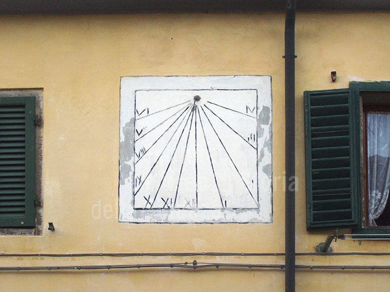 Mine of Caporciano, sundial on the facade of the ex administration buildings of the copper mine, Montecatini Val di Cecina.