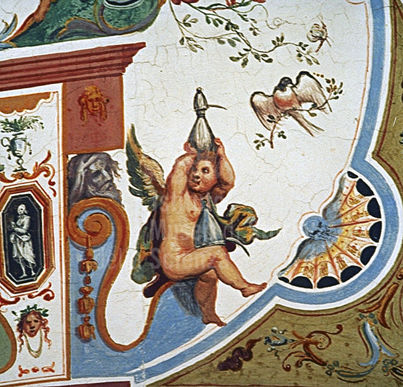 Scena allegorica affrescata raffigurante un puttino con strumenti alchemici, Palazzo Pitti, Museo degli Argenti, Firenze.