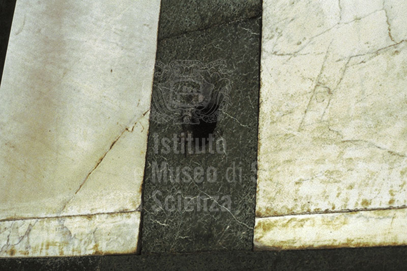 Hole of the gnomon built by Egnazio Danti inside the Basilica of Santa Maria Novella, Florence.