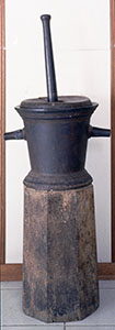 Bronze mortar in the the Pharmacy Betti, Sinalunga.