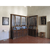 Room with display case containing rifles. Villa Medicea di Cerreto Guidi - Museo Storico della Caccia e del Territorio.