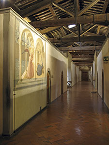 Right-hand corridor on the first floor of the Museo di San Marco in Florence, with the Annunciation by Fra Angelico.