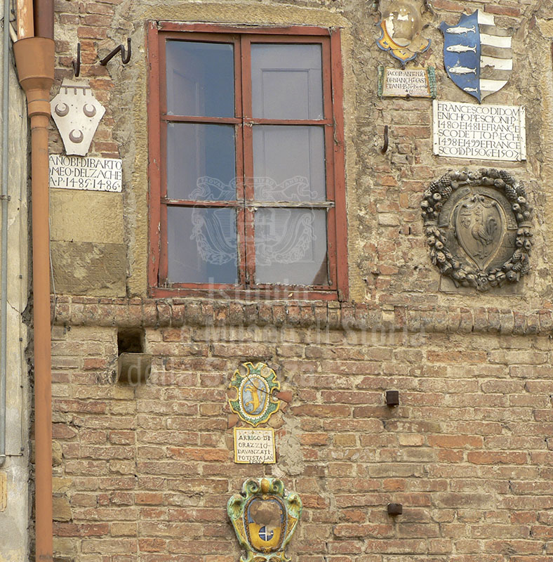 Detail of the faade of the Museo Civico di Montaione (FI) decorated with coats of arms.