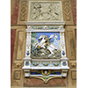 San Giorgio e il Drago. Ceramica sulla facciata interna di villa Stibbert, Firenze.