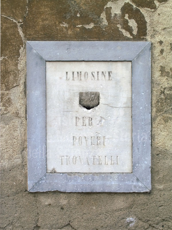 Stone with hole for collecting "alms for the poor orphans", Public Health Cultural and Scientific Legacy Documentation Centre, Pisa. .