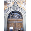 Portone d'ingresso con decorazioni, Centro Documentazione Tutela e Valorizzazione del Patrimonio Culturale e Scientifico della Sanit Pubblica, Pisa.