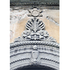 Decorazioni sopra il portone d'ingresso con raffigurazione di un bambino in fasce, Centro Documentazione Tutela e Valorizzazione del Patrimonio Culturale e Scientifico della Sanit Pubblica, Pisa.