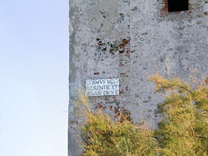 Inscription on the Medici tower near the New Tower, San Vincenzo.