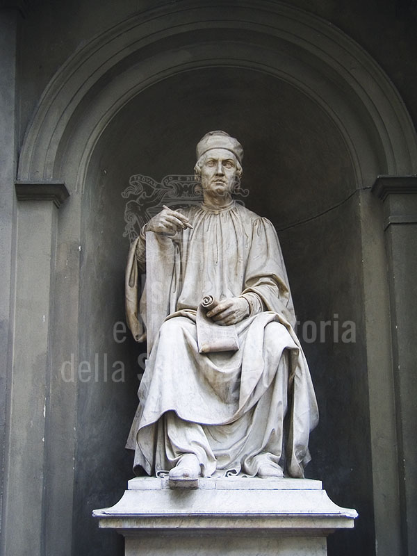 Statue of Arnolfo di Cambio looking towards the Cathedral he designed, Florence.