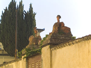 Statues over the entrance of the Torrigiani Garden on Via del Campuccio, Florence.