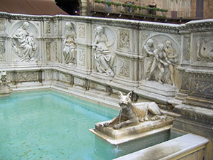 Sculptural decorations on Fonte Gaia in Piazza del Campo, Siena.