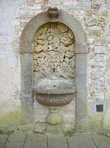 Drinking fountain adjoining the Abbey of San Lorenzo in Coltibuono, Gaiole in Chianti.