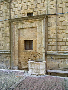 Particolare della facciata di Palazzo Piccolomini, Pienza.