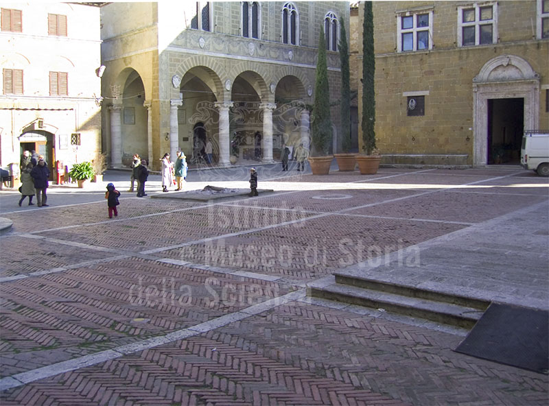 Pavement of the Piazza Pio II of Pienza with the lines in white marble that tend to bring out perspective space.